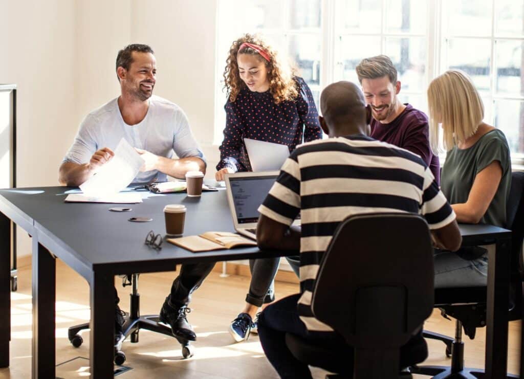 Creative team collaborating on innovative ideas during a brainstorming session.