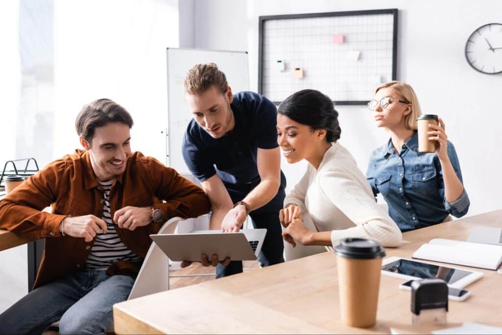 Creative team collaborating and sharing ideas in an inspiring workspace.