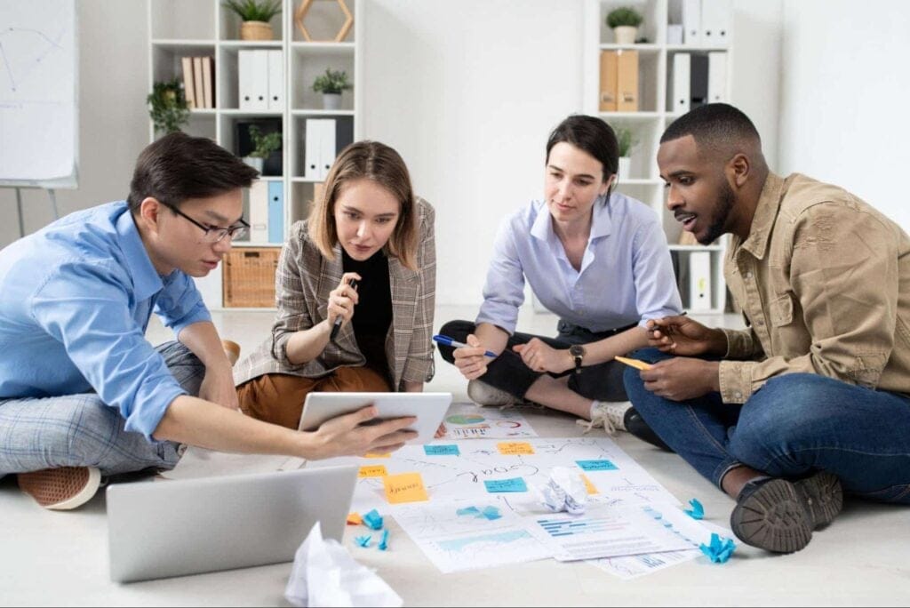 Team collaborating on creative ideas during a brainstorming session.