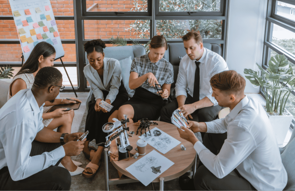 Creative team brainstorming in a modern workspace, collaborating on innovative ideas.