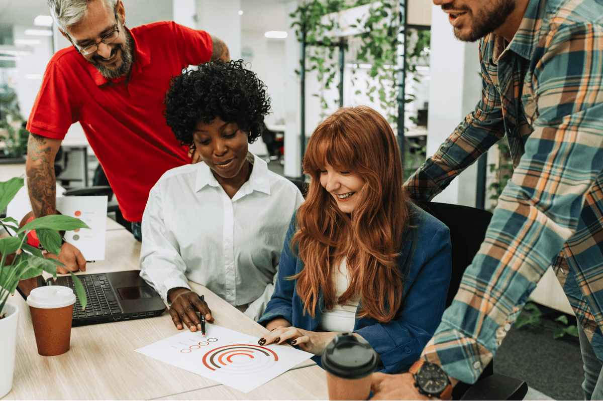Team reviewing and discussing organizational agility progress