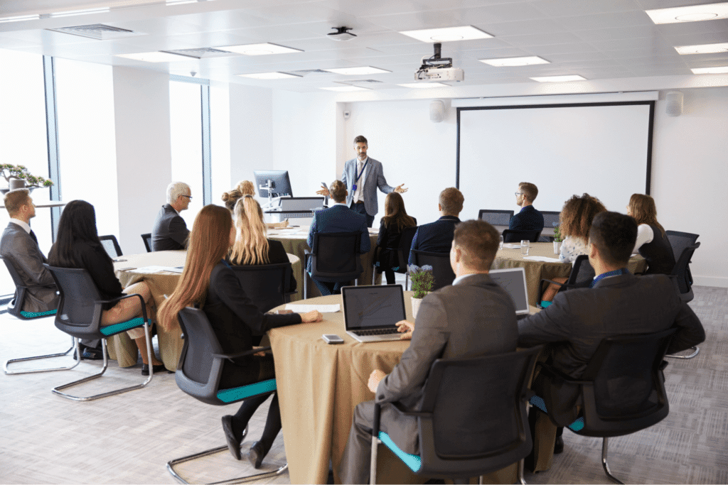 Business meeting showcasing effective presentation strategies in a modern conference room.