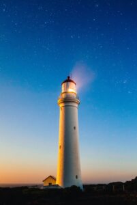 A lighthouse which symbolizes the leadership skills that are needed to guide teams during volatile times.
