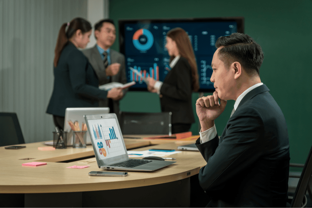 Team collaborating with visual aids during a strategic meeting.