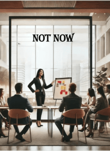 Business presentation with a confident presenter facing a focused audience in a modern office.