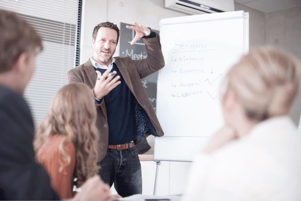 Dynamic presenter engaging audience during an effective communication workshop.