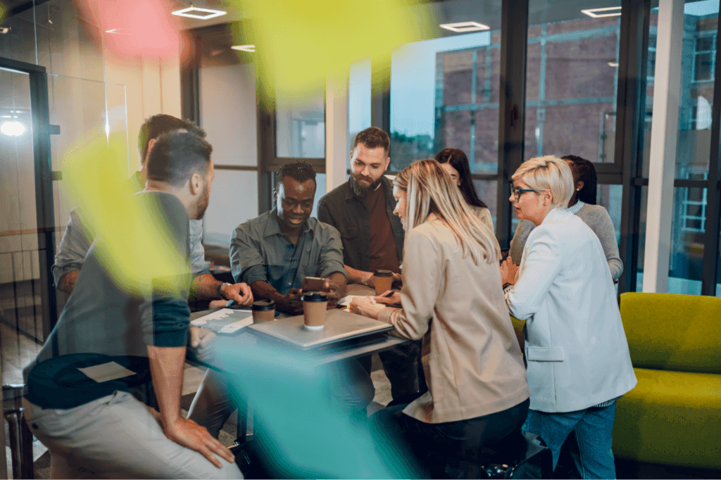 Team brainstorming session in a modern workspace focused on collaboration and innovative ideas.