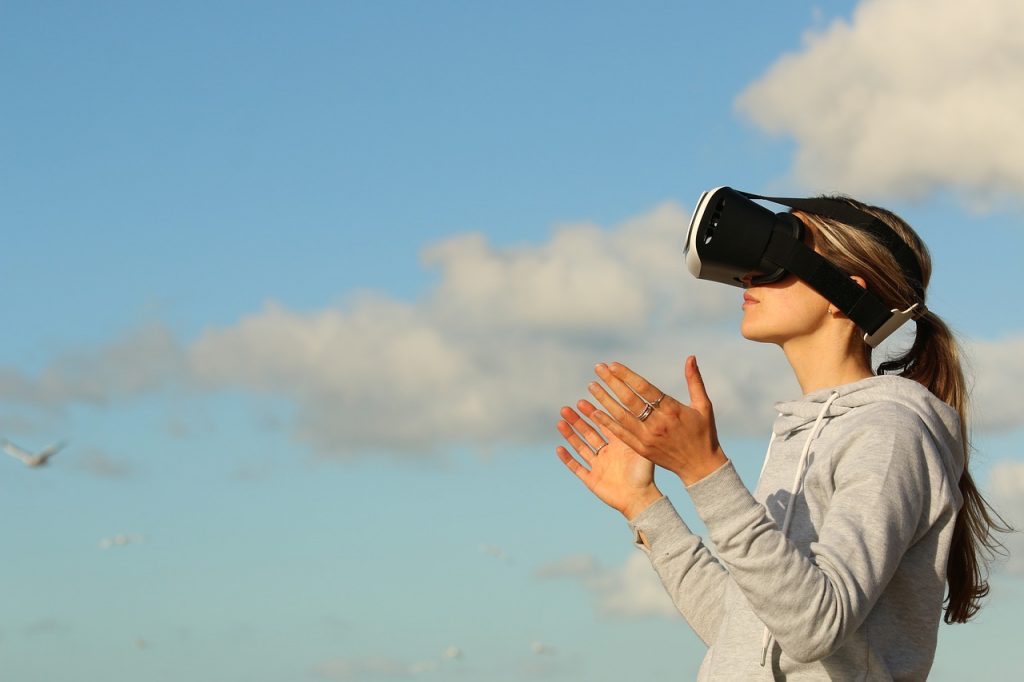 woman wearing virtual reality glasses for virtualization