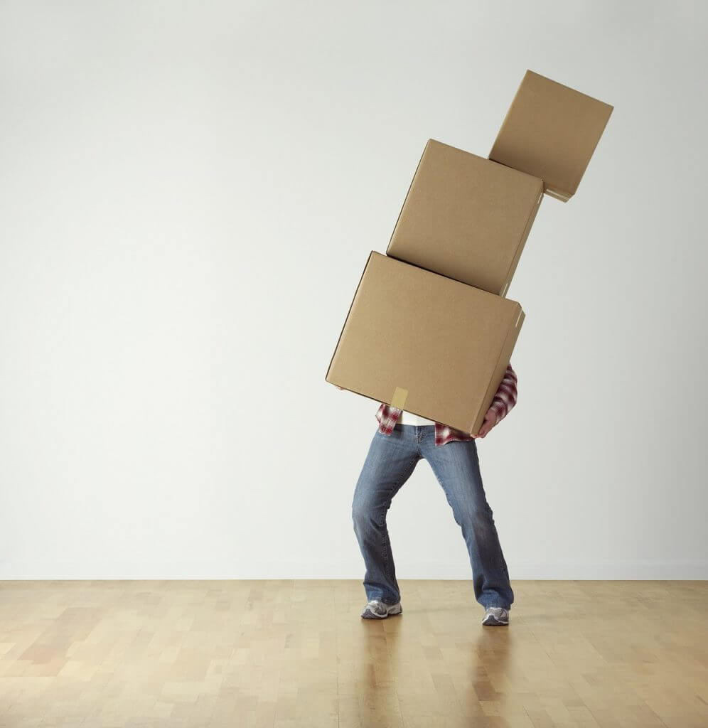 Not getting Done Done, Top 5 Causes of Sprint Carryover - Man carrying boxes