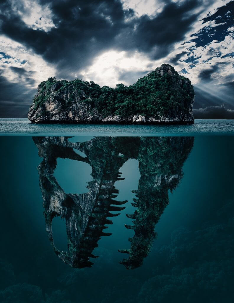 Hidden project plan represented through an island that is actually a skull underwater. - Fight it with Agile