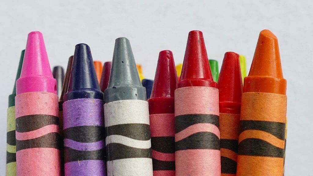 Crayons - an Agile feature team is like a box of various colors, whereas a specialist team is a grouping of the same color