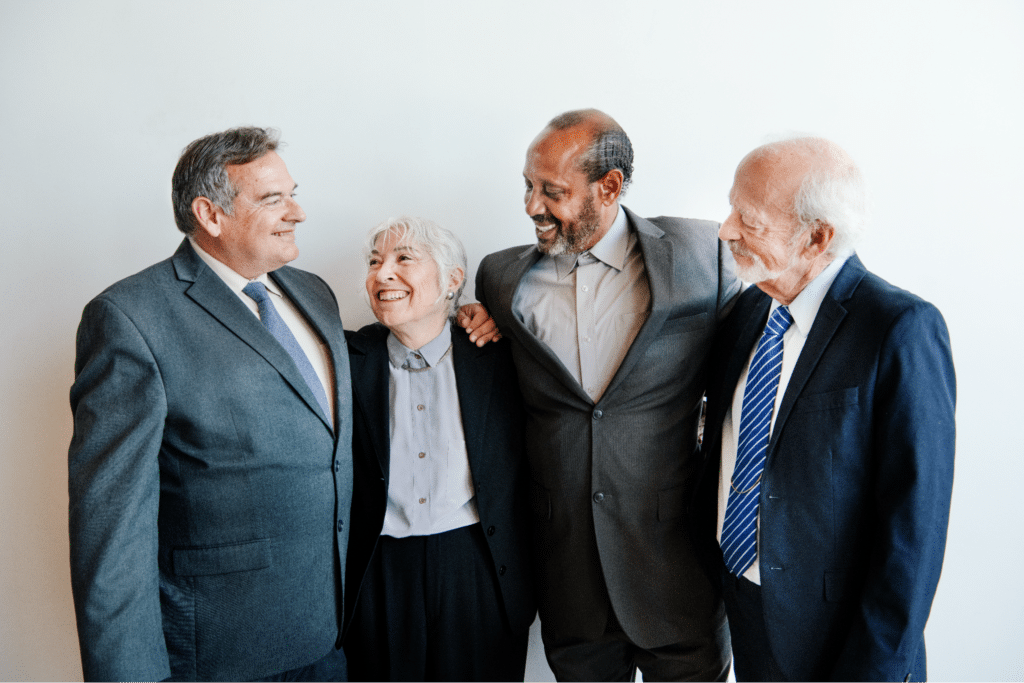 Friends and colleagues enjoying meaningful connections in a joyful gathering.