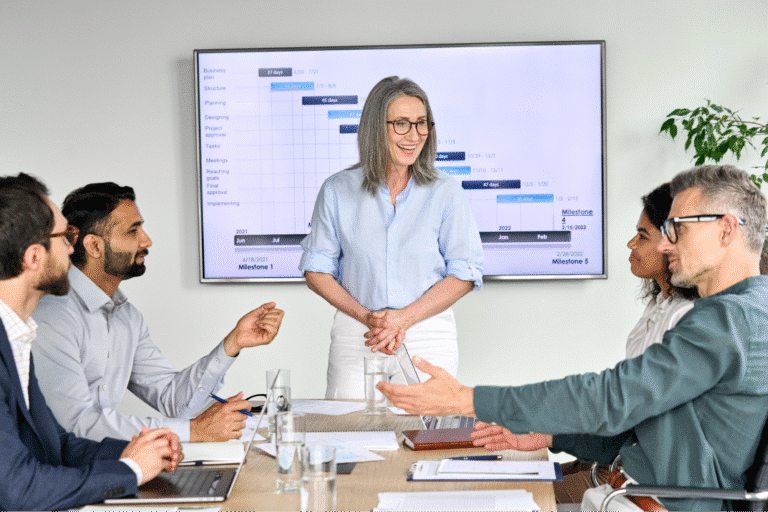 Team discussing data insights during a professional meeting.