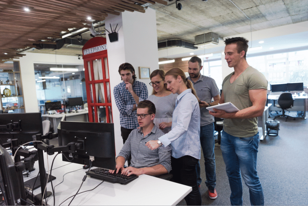 Engaged software team collaborating effectively in a modern office environment.