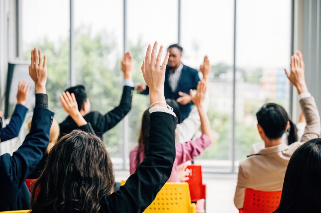 Business professionals come together for a corporate event featuring a conference and convention