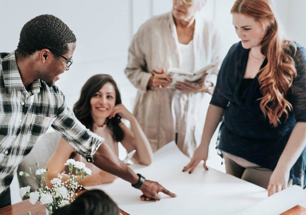 Diverse business people working together