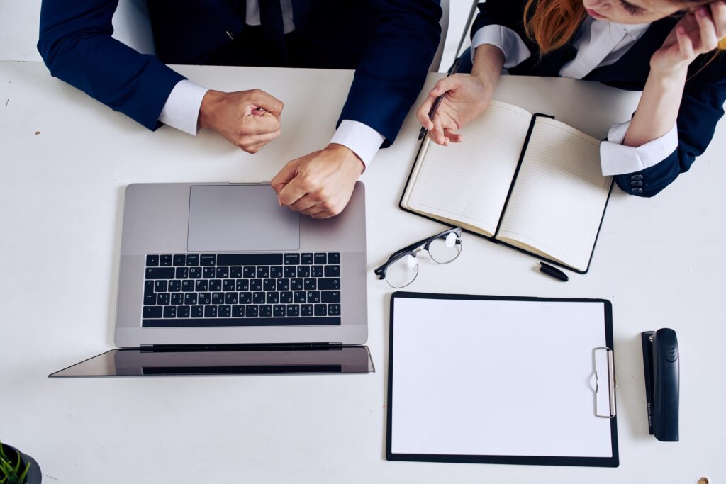managers teamwork in the office with laptop professionals