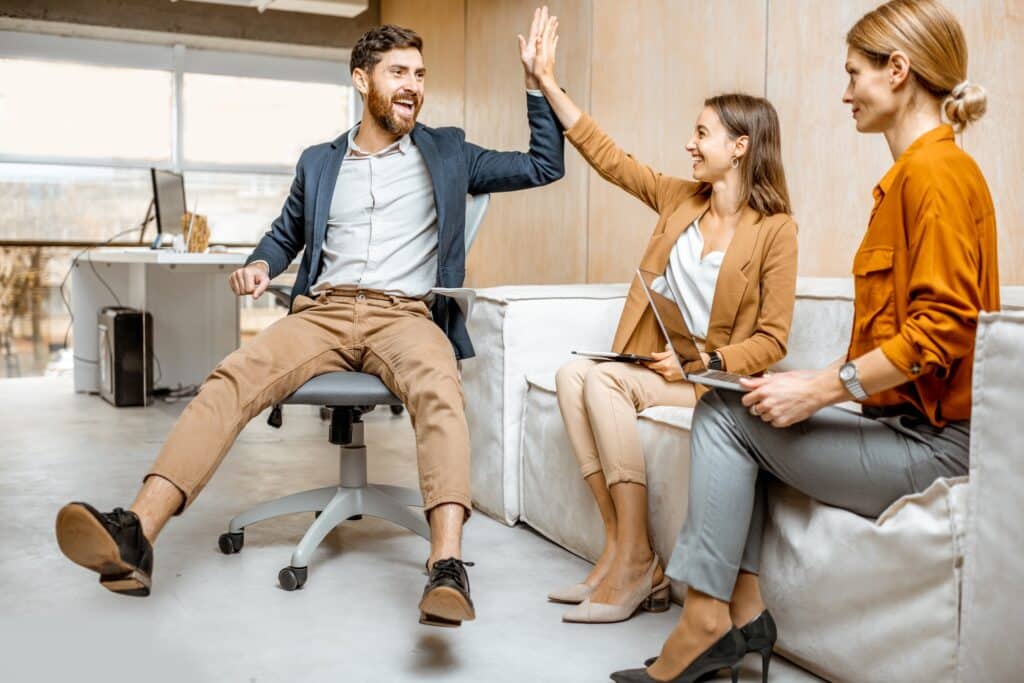 Playful employees having fun in the office